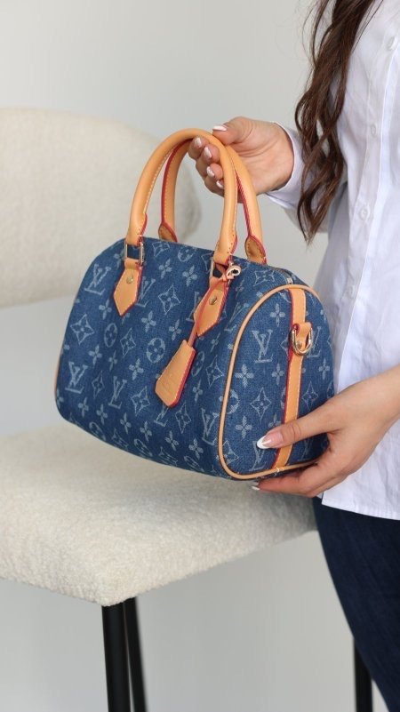 شنتة - LV Speedy / شامل علبة الشركة ( جينز )